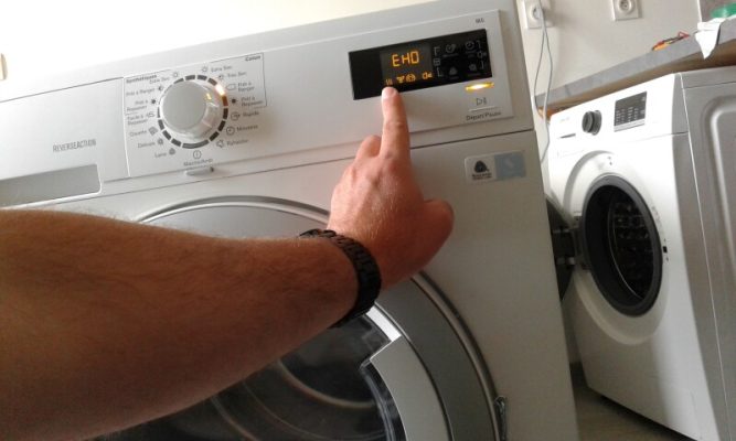 máy giặt electrolux báo lỗi eho